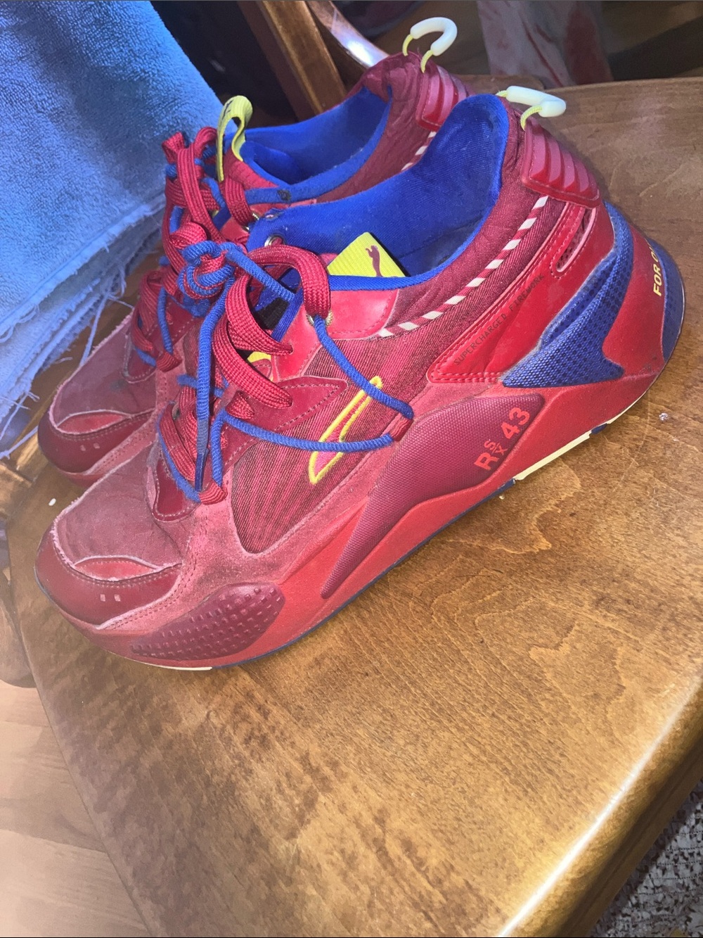Puma Red Sneakers with Blue and Yellow Accents